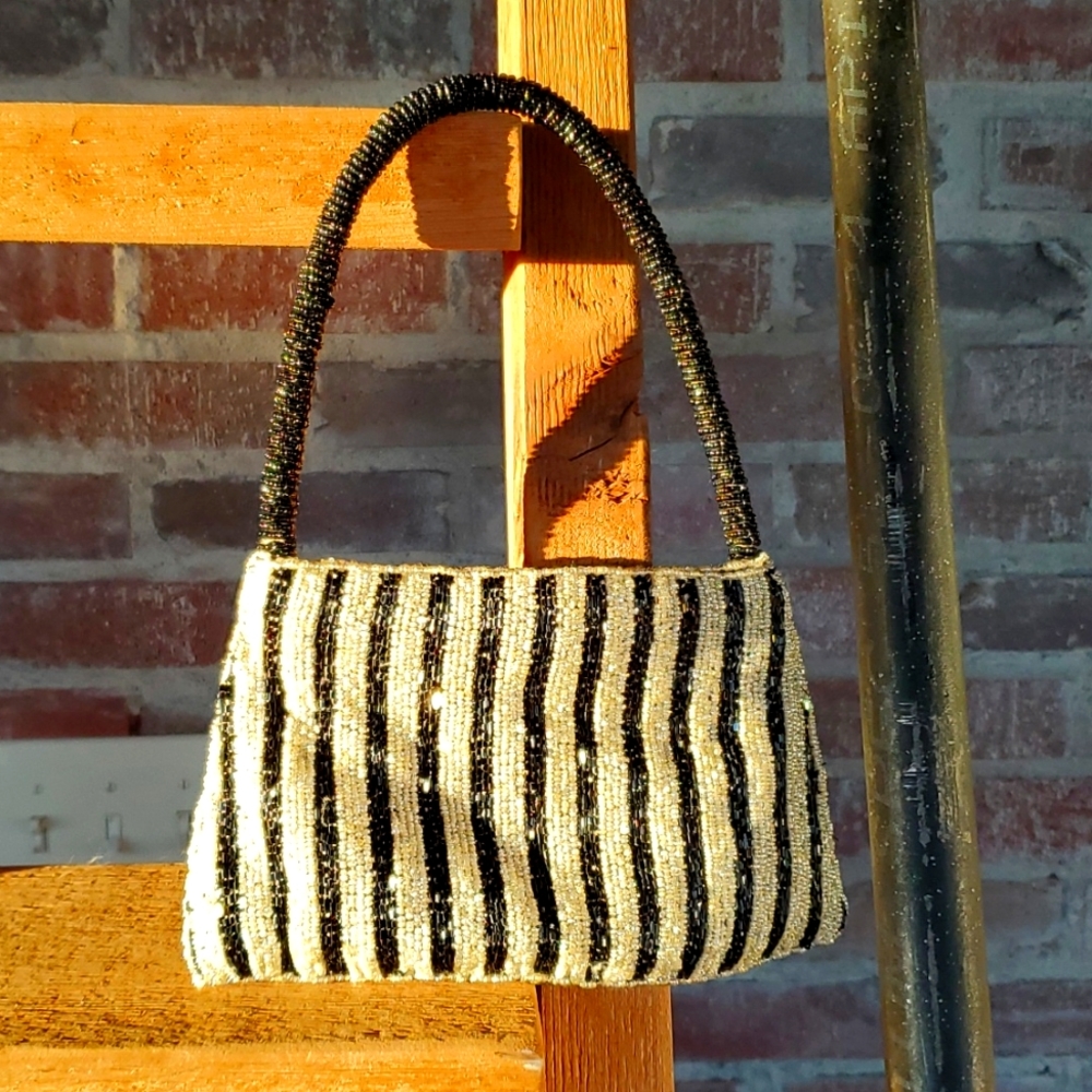 PERFECT evening bag!! Like new black/champagne striped shimmer beaded